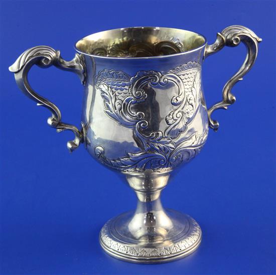 A George III Irish silver two handled pedestal cup, 14 oz.